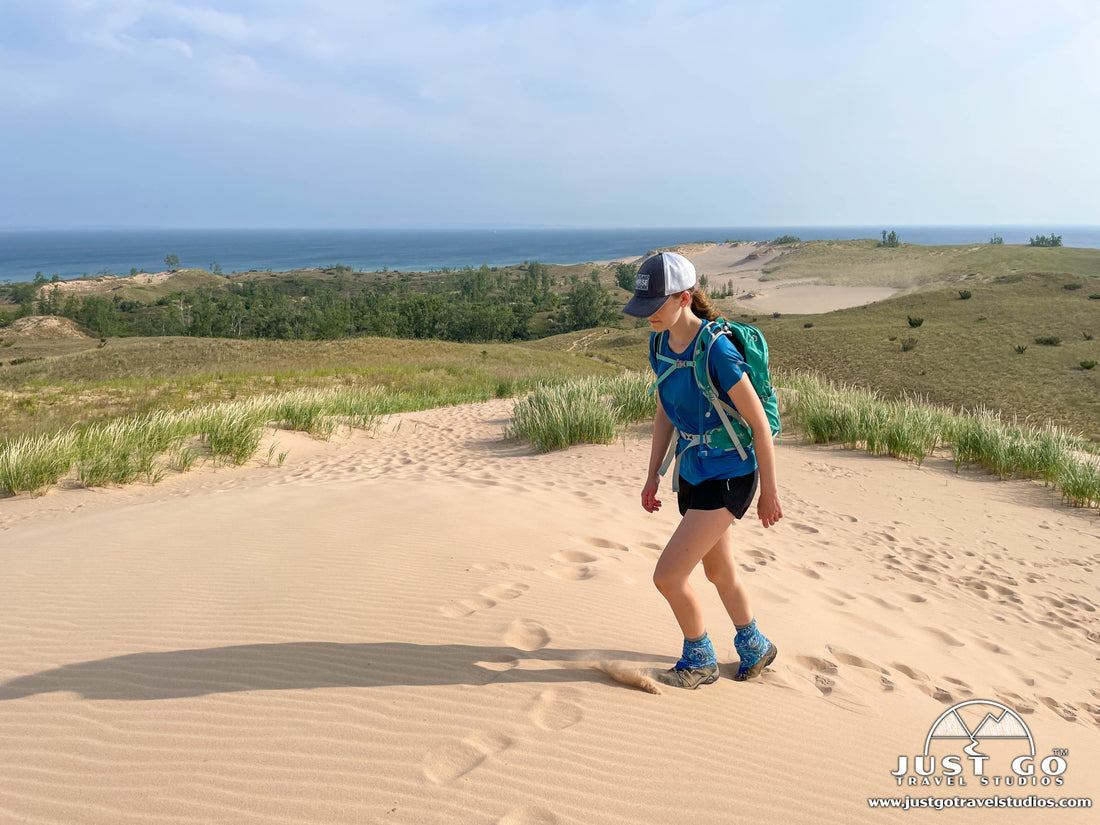 hiker on Sleeping Bear Point Trail