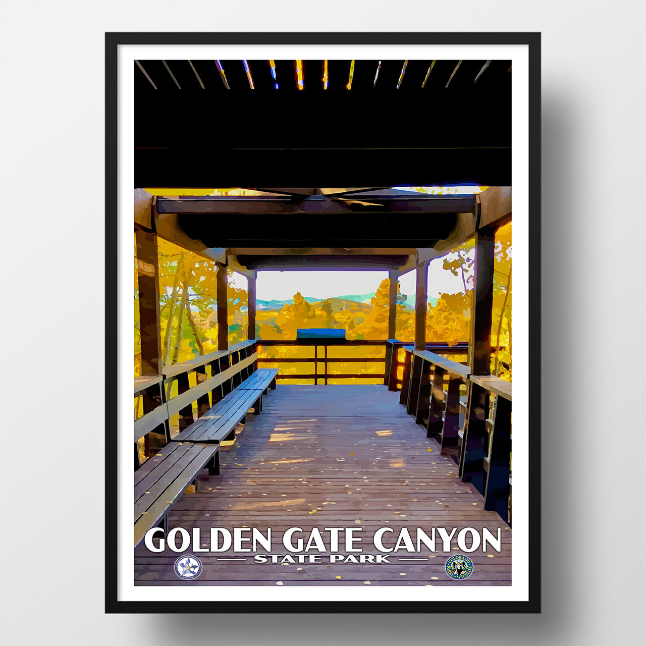 Wooden walkway with benches leading to a scenic view at Golden Gate Canyon State Park.