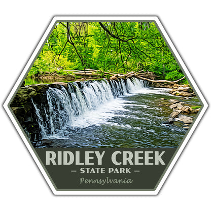 Hexagonal sticker of Ridley Creek State Park with a waterfall and greenery.